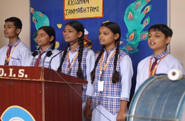 Students speaking at a school event, Daffodil International School